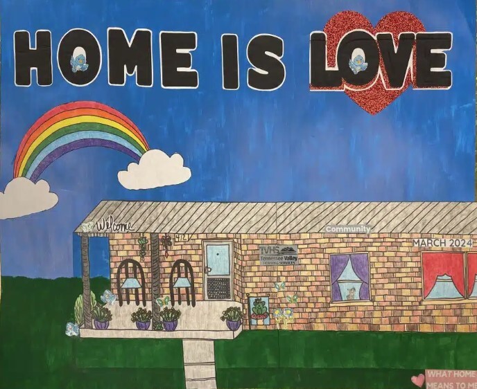 What Home Means to Me 2025 Calendar. A brick home with a rainbow above it with text that reads Home is Love.